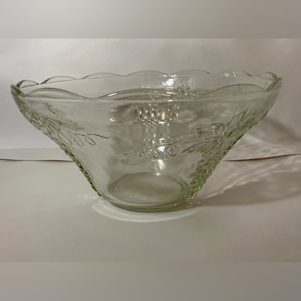 Glass punch bowl with grapevine detail.